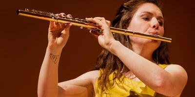 Ariane Brisson playing flute